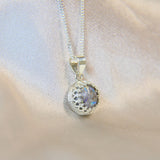 Heavy ashes( naturally grey in colour) heavy opalescent flecks, pearl white shimmer