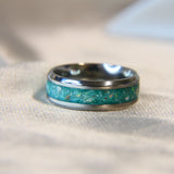 Titanium band, teal shimmer, heavy ashes, white opal