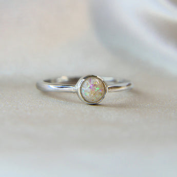 Pearl white shimmer, heavy ashes( natural ashes were very white) heavy opalescent flecks