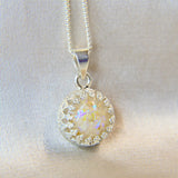 Lightly sprinkled ashes, pearl white shimmer and subtle opalescent flecks