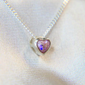 New Version- Light pink shimmer, subtle opalescent flecks, lightly sprinkled ashes