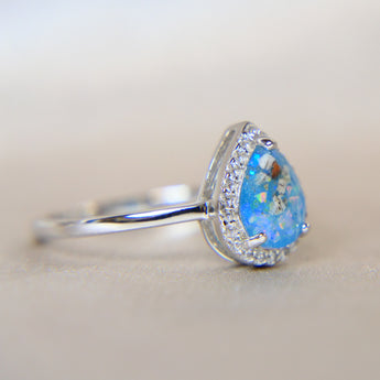 Light blue shimmer, heavy ashes and white opal