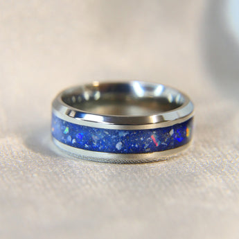 Titanium band, midnight blue shimmer, heavy ashes, white opal