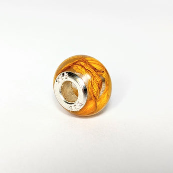 Sunflower petal in clear resin bead