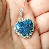 Heavy ashes, sapphire blue shimmer, subtle white opal