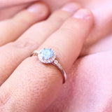 Milk, pearl white with cornflower blue opal