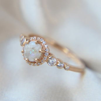 Ashes, opalescent flecks, pearl white shimmer (just to display a rose gold band)