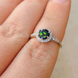 Ashes and breastmilk memorial ring with black shimmer and opalescent flecks