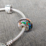 Hair, pearl white shimmer, heavy rose gold flecks, ocean green opal