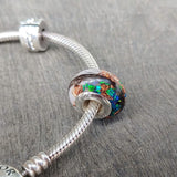 Hair, pearl white shimmer, heavy rose gold flecks, ocean green opal
