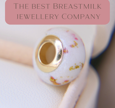 Breastmilk bead with gold bead cores, pearl white shimmer and pink opal, gold flecks 