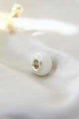 Breastmilk bead with pearl white shimmer