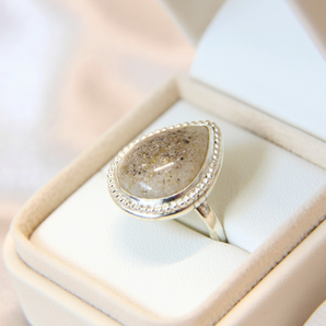 Ashes ring with pearl white shimmer and gold flecks