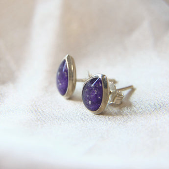 Violet shimmer, lightly sprinkled ashes in the pear keepsake earrings