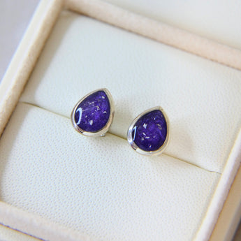 Violet shimmer, lightly sprinkled ashes in the pear keepsake earrings