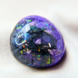Violet and black shimmer, ashes, opalescent fleck and crushed white opal