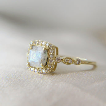 9k yellow gold band, light cremations, opalescent fleck, white opal and subtle pearl shimmer 