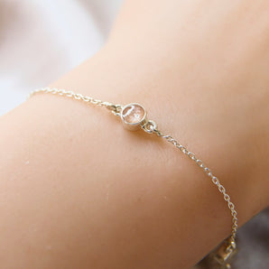 Sterling silver bracelet with nude shimmer and lightly sprinkled ashes 