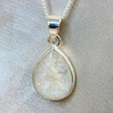 14 x 10 silver with pearl white shimmer, lightly sprinkled ashes and white opal