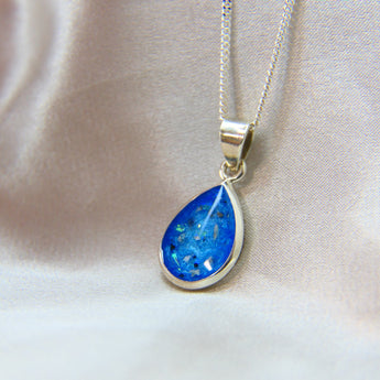 14 x 10 silver with light blue shimmer, lightly sprinkled ashes & subtle opalescent flecks 