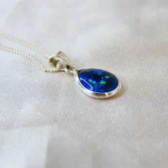14 x 10 silver with Sapphire blue shimmer, embryo sack/blood and subtle opalescent fleck