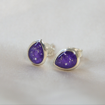 Violet shimmer, lightly sprinkled ashes in the pear keepsake earrings