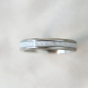 Lightly sprinkled ashes, pearl white shimmer, titanium band 