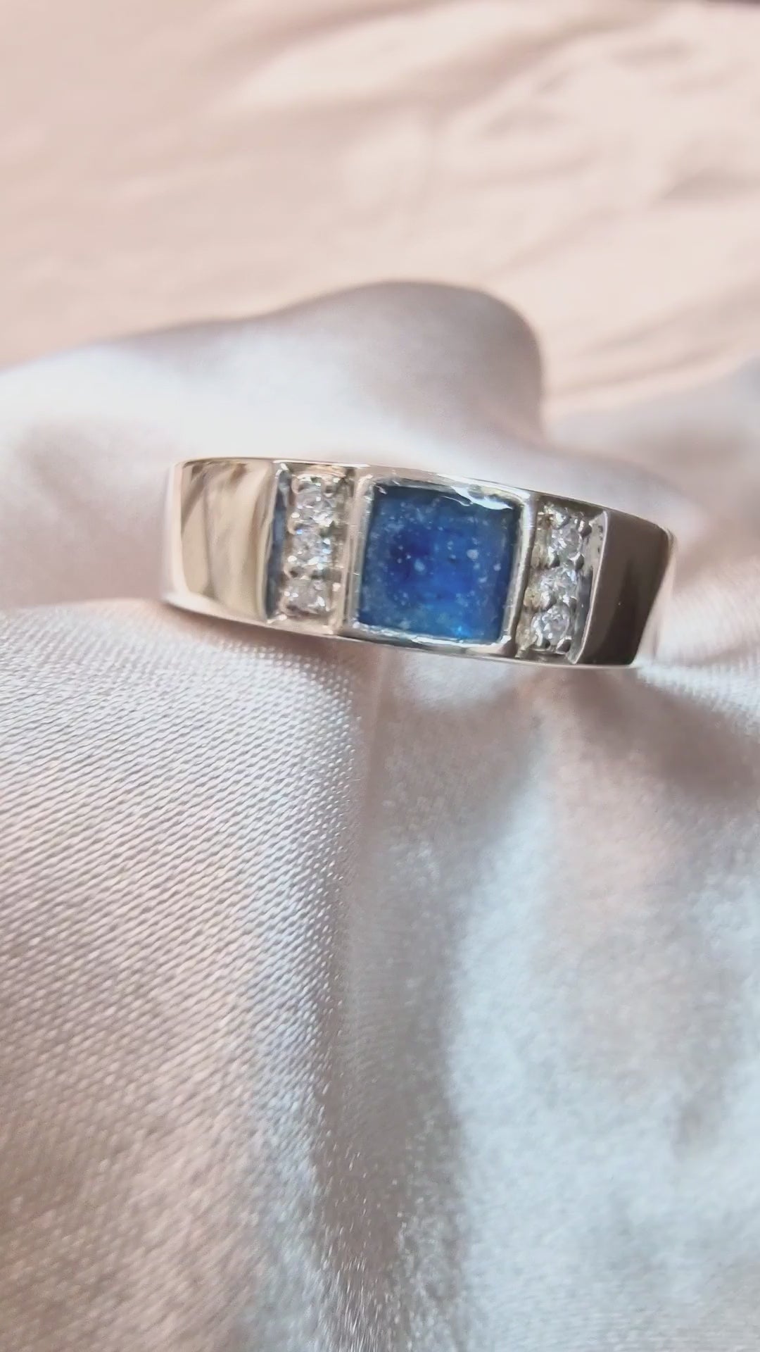 Lightly sprinkled ashes, sapphire blue, silver band 