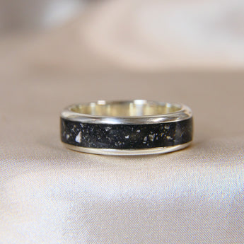 Silver band, black shimmer, heavy ashes 