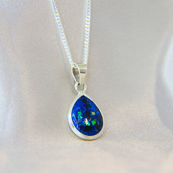 14 x 10 silver with Sapphire blue shimmer, embryo sack/blood and subtle opalescent fleck