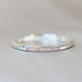 Silver band, lightly sprinkled ashes, pearl white shimmer and heavy rose gold fleck