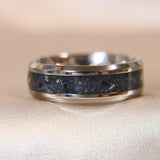 Titanium band, charcoal grey shimmer, lightly sprinkled ashes, black flecks 