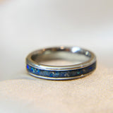 Titanium band, charcoal grey shimmer, heavy ashes, blue fleck ( heavy), cobalt blue opal