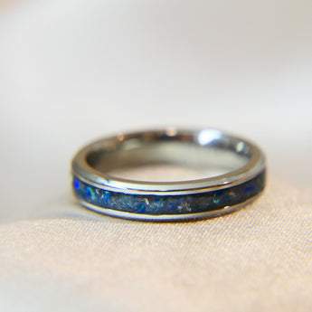 Titanium band, charcoal grey shimmer, heavy ashes, blue fleck ( heavy), cobalt blue opal