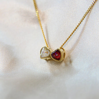 Yellow gold hearts, lightly sprinkled ashes, pearl white shimmer, subtle Opalescent flecks, red shimmer 