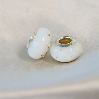 Silver beads, milk, subtle umbilical cord and pearl white shimmer 