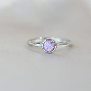 Light pink shimmer, heavy ashes, heavy opalescent 