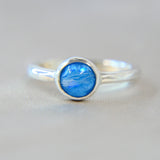 Pet fur, light blue shimmer, subtle opalescent flecks 