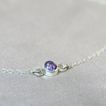 Silver bracelet with light ashes, violet shimmer and purple opal