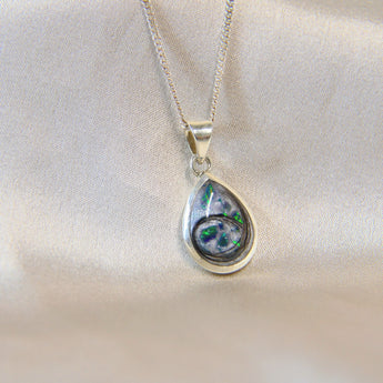 14 x 10 silver with pearl white shimmer,, lightly sprinkled ashes, pet fur in curl, ocean green opal