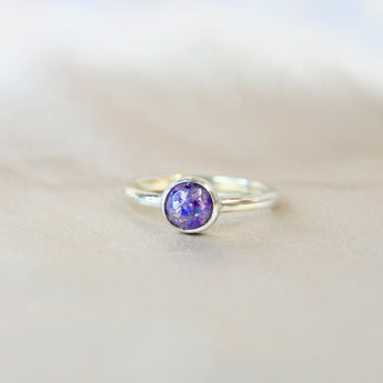 Silver band, violet shimmer, heavy ashes, subtle silver flecks & purple opal