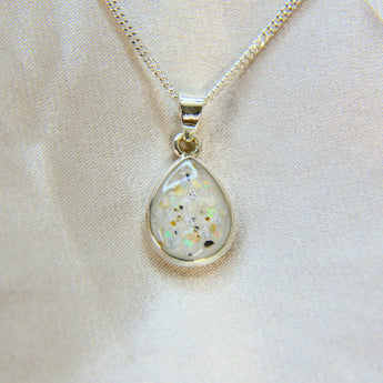 8 x 10 silver with pearl white shimmer, heavy sprinkled ashes,subtle silver flecks and aquamarine/mint opal