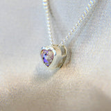 New Version- Light pink shimmer, subtle opalescent flecks, lightly sprinkled ashes, white opal
