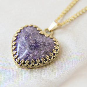 Violet shimmer, heavy ashes  9k yellow gold setting 