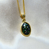 14 x 10 Gold setting, heavy ashes, black shimmer, subtle gold flecks, ocean green opal