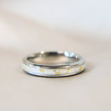 Titanium band, breastmilk, pearl white shimmer & heavy gold flecks