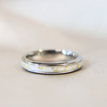 Titanium band, breastmilk, pearl white shimmer & heavy gold flecks