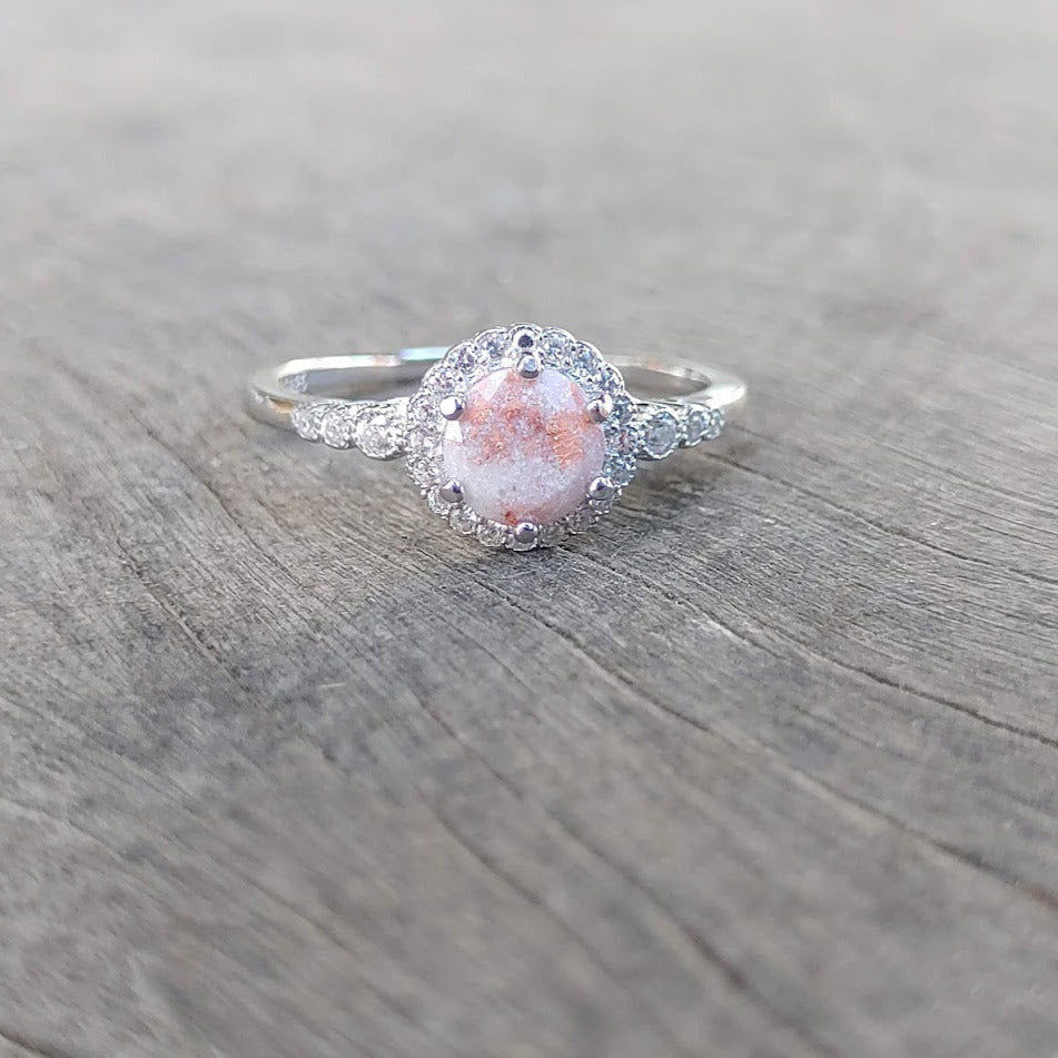 Breastmilk ring with pearl white shimmer, pink shimmer and rose gold flecks