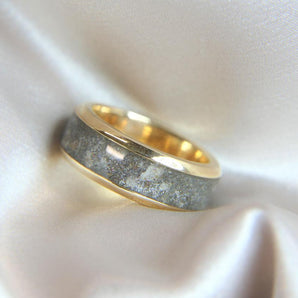 Yellow gold keepsake band with ashes and charcoal grey shimmer