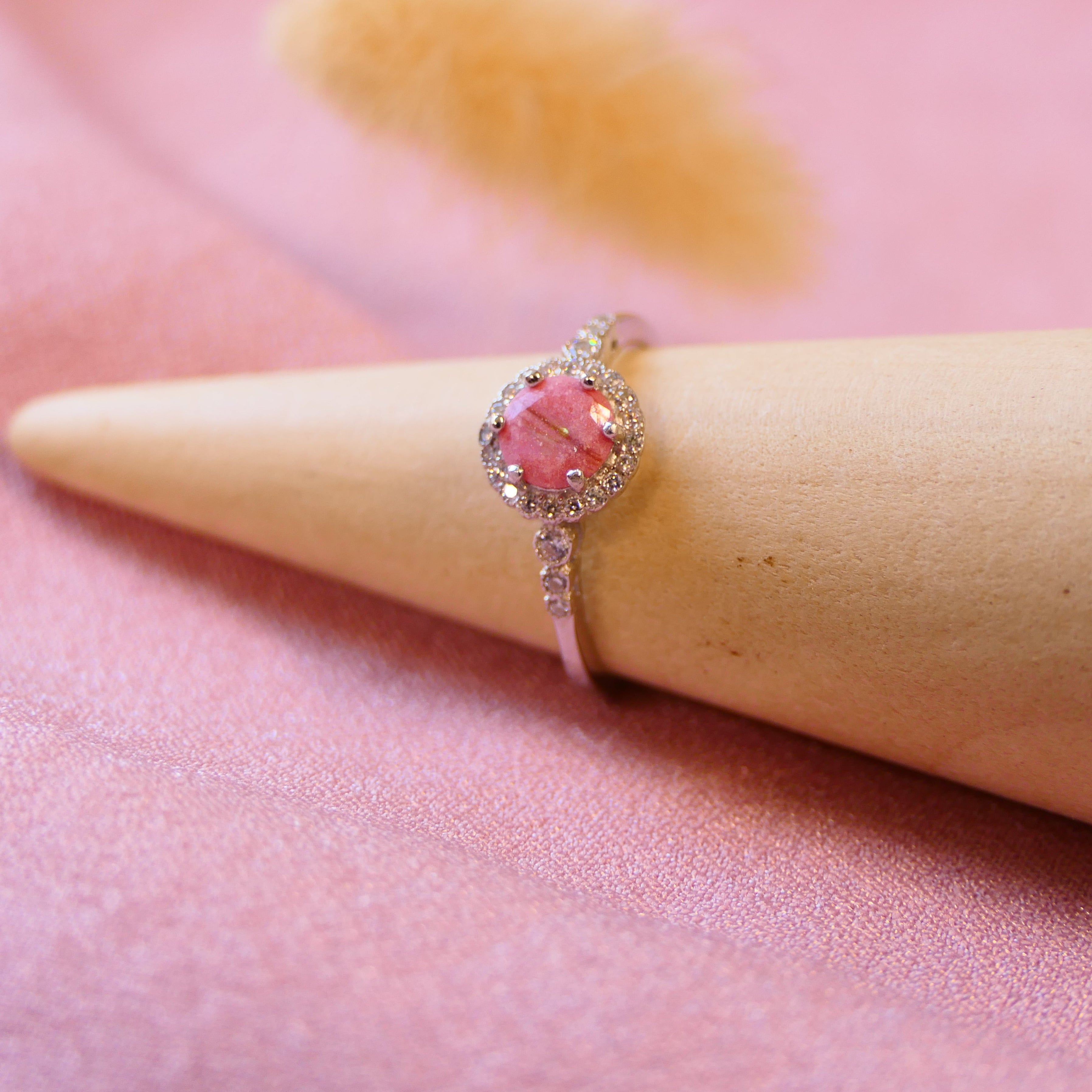 memorial ring with hair strands, opal flecks and briar rose pink shimmer